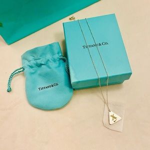 Tiffany & Co. Nike Sterling Necklace and complete packaging